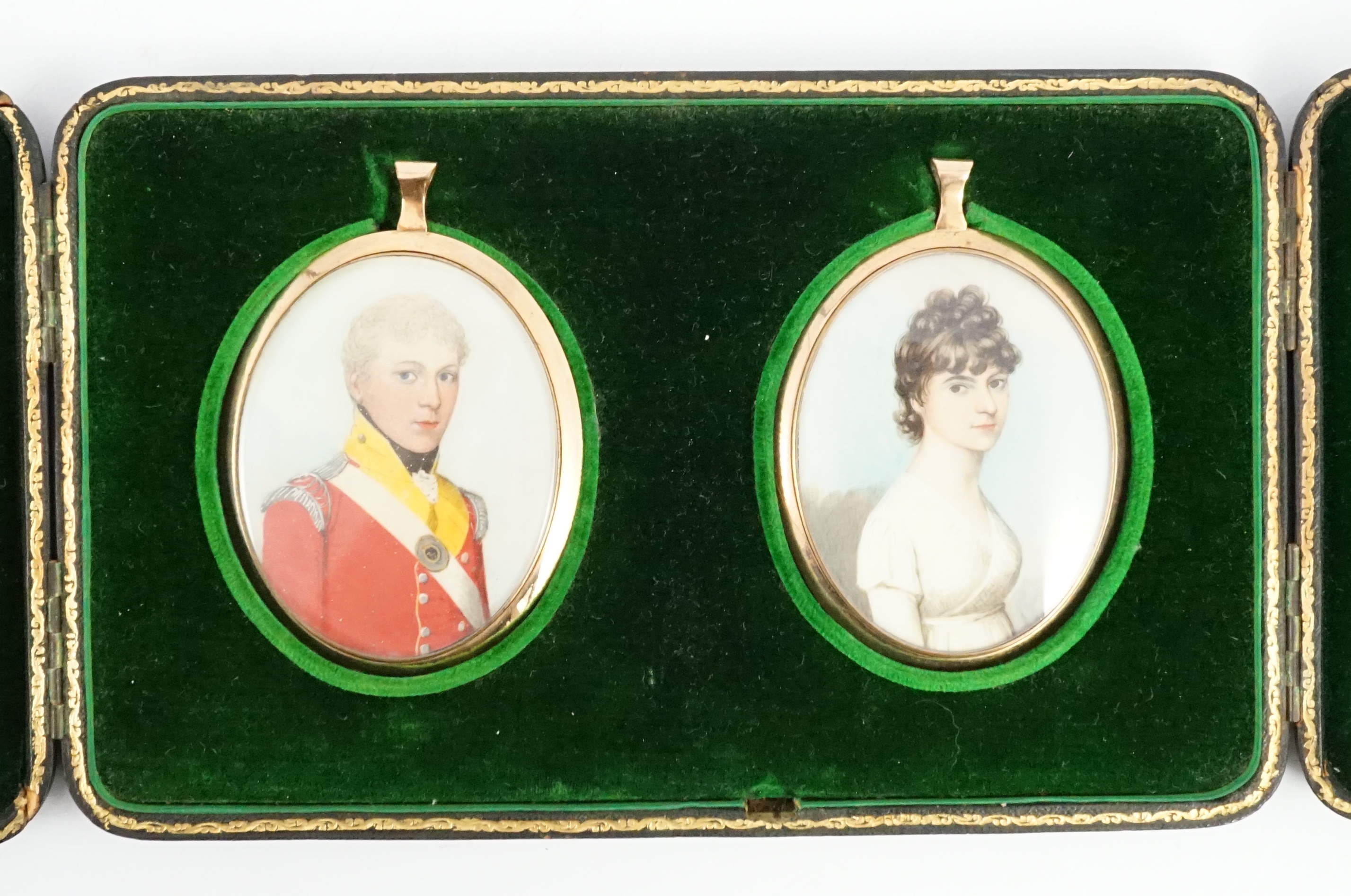 Attributed to Frederick Buck of Cork (Irish, 1771-1833), Portrait miniatures of an army officer and his wife; Charity and rustic lovers verso, watercolour on ivory, 6 x 4.75cm. CITES Submission reference 5NH5T3JW